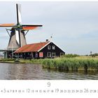 Text: „Zaanse Schans“, „9“, „CASARES EDITION“. Eine traditionelle Windmühle an einem Fluss, mit einem angrenzenden Haus.
