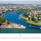 Text: "Moselmündung", darunter Monatskalender September. Ansicht einer Stadt an zwei Flüssen mit vielen Bäumen und Brücken.