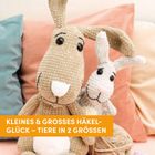 Text: "Kleines & großes Häkelglück – Tiere in 2 Größen." Zwei gehäkelte Hasen, einer groß, einer klein, auf Kissen.