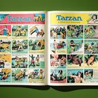Comic-Doppelseite mit Titeln "Tarzan by Edgar Rice Burroughs". Viele bunte Panels mit Dschungelszenen.