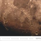 Text unten: "SEPTEMBER". Bild eines detaillierten Mondoberflächenabschnitts mit Kratern und Gebirgsketten.
