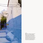 07 COLOR 93

Ein schmaler Gassenweg in Chefchaouen, Marokko, mit blauen Mauern und gelben Pflanztöpfen, führt sanft aufwärts.