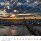 Kalenderblatt: September 2027. Text: "Der Rhein von Mainz bis Köln". Sonnenuntergang über Köln mit Dom und Rheinblick.