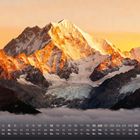 Kalender mit den Zahlen 1 bis 30 in einer Reihe unten. Berghorizont bei Sonnenaufgang.