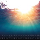 Zahlen und Wochentage, darunter ein Sonnenstrahl, der durch das klare Wasser schimmert. Unten rechts die Zahl "9".