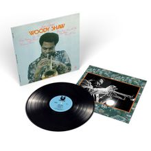 "Woody Shaw", Albumcover mit Musikerbild; schwarze Vinylplatte mit blauem Label daneben, jazziges Thema.