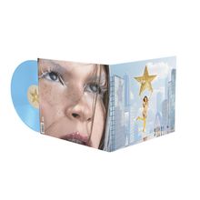 Text: „ncl + ultrafrance.com“. Illustration: Links Gesicht, rechts Frau mit Stern zwischen Wolkenkratzern, blaue Vinylplatte.