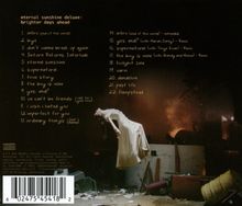 Das Cover zeigt eine Trackliste mit 22 Titeln. Der Hintergrund zeigt eine schwebende Person in einem abgenutzten Raum.