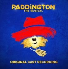 Text: "Paddington The Musical", "Please look after this bear. Thank you", "Original Cast Recording". Illustration: Bär mit rotem Hut.