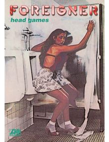 "Foreigner head games" steht auf einem Buch. Vier CDs daneben tragen ähnliche Aufschriften wie "2026 Stereo Remix".