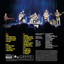 Vinyl- und DVD-Tracklisten mit Songs wie "AIN'T NOBODY WHITE" und "LILI MAY". Eine Band spielt auf einer beleuchteten Bühne.