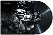 „october tide“, „grey dawn“. Albumcover mit abstraktem, schwarz-weißem Gesicht und verzweigten Mustern. Vinyl-Schallplatte sichtbar.