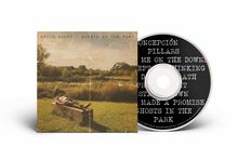 Text: Bruce Soord / Ghosts in the Park, Concepción, Pillars, Me on the Down, Kept in the Thinking, Death, Present, Stained, Made a Promise, Ghosts in the Park.  

Illustration: Eine Person liegt auf einer Bank in einem sonnigen Park. Rechts eine CD mit obigen Titeln.