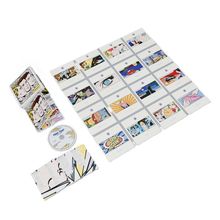 Ein CD-Cover zeigt Comic-Illustrationen. Auf der CD steht "TAKE THAT". Mehrere Karten mit bunten Bildern sind ausgebreitet.