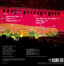 Texte: Side A: Nouveau Son 9:12, Lilac 7:44, Nightwatch 5:20. Side B: You Play For Us Today 7:13, Nomads 6:18, Laila 8:39. Konzertbühne mit Band.