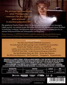 **Texte:** Die einzigartige Geschichte einer Filmlegende – nominiert für drei Oscars® – jetzt erstmals in atemberaubendem 4K!

**Beschreibung:** Ein Mann mit einem Filmprojektor im Hintergrund, Filmrollen sichtbar.