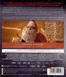 Texte: "Special Feature: Unwrapping a New Legacy". Bild zeigt Weihnachtsmann mit Messer, umgeben von Lichtern.