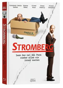 "STROMBERG. Lass das mal den Papa wieder alles wie immer machen." Ein Mann in Anzug und ein Karton.