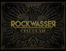 Rockwasser: C'est La Vie (Limited Numbered Boxset), 1 CD und 1 Merchandise