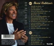"Ich halt zu dir" CD-Trackliste von Hansi Hinterseer und ein lächelnder Mann in einem dunklen Outfit.