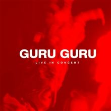 „GURU GURU“ und „LIVE IN CONCERT“ in weiß auf einem verschwommenen, roten Hintergrund.