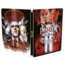 "PHANTASM DAS BÖSE" in großen Buchstaben, düstere Zeichnung mit bedrohlichem Mann, Frau und unheimlicher Atmosphäre.