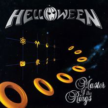 „Master of the Rings“, Helloween. Illustration: Gelbe Ringe, Symbole im Weltall, ein Kürbis im Logo.