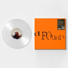 Orange Plattenhülle mit „dFOuNd“ in verzerrter Schrift, klare Vinylplatte daneben.