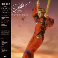 Text: "Sheila and B. Devotion", "King Of The World", "Audiophile Edition". Frau im roten Fallschirmsprunganzug am Himmel.
