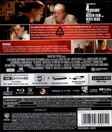 **Der junge Cop Billy Costigan (Leonardo DiCaprio) wuchs im kriminellen Milieu auf.** Zwei Männer in einem intensiven Gespräch.