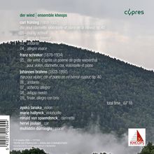 Texte über Musikstücke und Künstler. Im Hintergrund bewaldete Berge im Nebel. Rechts oben 'cypres', unten Logo von 'Kheops'.