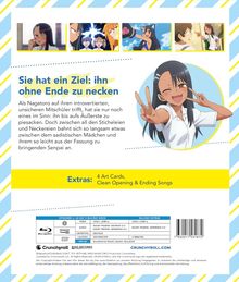 "Sie hat ein Ziel: ihn ohne Ende zu necken." Dann Bild einer jungen Frau im Anime-Stil mit Victory-Handzeichen.