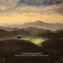 "Warren Haynes Dreams & Songs" oben, "A Symphonic Journey with the Asheville Symphony Orchestra" unten. Landschaft mit Bergen.