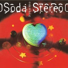 „Soda Stereo“ und „dynamo“ auf einem roten Hintergrund mit einem grünen Herz und bunten Kugeln.