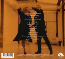 Eine Liste von 15 Songtiteln, darunter "Straighten Up and Fly Right" und "Play a Simple Melody", auf orangefarbenem Hintergrund.