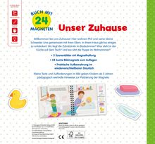 Logo: "Buch mit 24 Magneten". Text: "Unser Zuhause". Beschreibung über Kinderbuch mit Szenenbildern und Bildmagneten. Illustration: Kinder im Bad. Symbole: Altersempfehlung 3+, Kreativität, Feinmotorik, Konzentration. Enthält ein Quietscheentchen, Seife, Zahnbürste.