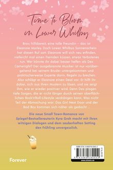 "Time to Bloom in Lower Whilby" steht in geschwungener Schrift oben, umgeben von rosa Blüten und einem Farbverlauf.