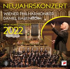 NEUJAHRSKONZERT, WIENER PHILHARMONIKER, DANIEL BARENBOIM, 2022. Dirigent vor Orchester in prachtvoll dekorierter Halle.