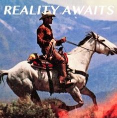 "Reality Awaits" steht auf einer CD-Hülle mit einem Cowboy auf einem galoppierenden weißen Pferd davor.