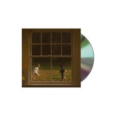 Zwei Kinder laufen über eine Wiese, sichtbar durch ein Fenster. Rechts ist der Rand einer CD zu sehen.