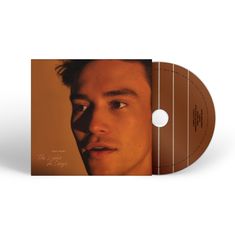 Texte: "Jacob Collier", "The Light for Days". Ein Cover mit einem Porträt eines jungen Mannes und einer danebenliegenden CD.