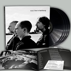 Text: "e.s.t. live in hamburg", "ACT". Drei Männer im Profil, Schallplatten und ein aufgeklapptes Booklet mit Texten.