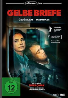 Titel: "Gelbe Briefe". Namen: Özgü Namal, Tansu Biçer. Film von İlker Çatak. Vorab-Cover. Personen im Zug; Frau wach, Mann schläft.