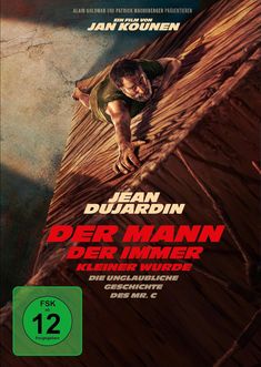 Text: "Ein Film von Jan Kounen", "Jean Dujardin", "Der Mann der immer kleiner wurde", "Vorab-Cover", "FSK ab 12 freigegeben".  
Ein Mann klettert eine riesige, steile Holzfläche hoch.