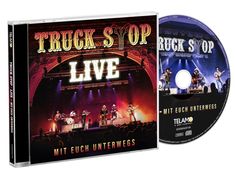 "TRUCK STOP LIVE" in großen Buchstaben, darunter "MIT EUCH UNTERWEGS". Ein Konzert mit beleuchteter Bühne. CD-Hülle.