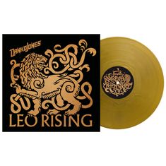 Text: "DANKO JONES LEO RISING." Illustration eines stilisierten goldenen Löwen auf schwarzem Hintergrund. Goldene Schallplatte.