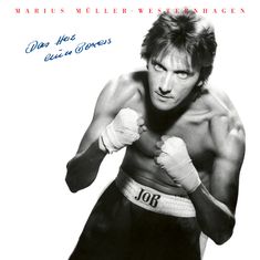 Text: "Marius Müller-Westernhagen", "Das Herz eines Boxers". Schwarz-weiß, Boxer in Kampfpose, trägt Handschuhe.