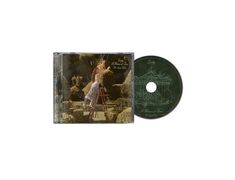 Texte: "A Matter of Time", "Lovely", "The Sweet Place". CD und Hülle: Frau auf Leiter im Garten, CD mit Karussell-Motiv.