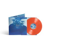 „Ed O’Brien, Blue Morpho“ auf einem blau gefärbten Vinyl-Cover, daneben eine rote Schallplatte.