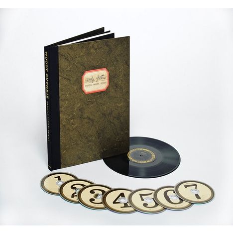 Woody Guthrie: American Radical Patriot (Limited Edition Box-Set) (6CD + DVD + 10" + Buch), 6 CDs, 1 DVD und 1 Single 10"
